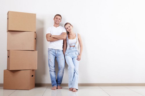 Office relocation planning in France with moving boxes and office furniture