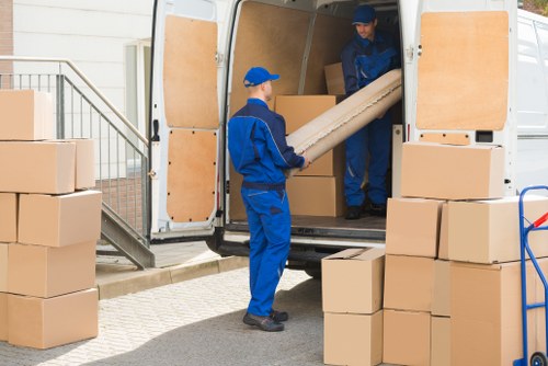 Removal team preparing equipment and safety measures before a move