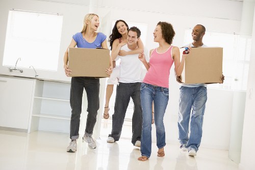 Moving boxes and furniture in a French home relocation