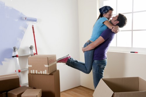 Professional office moving team handling equipment in France