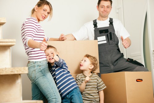 Specialist team moving an upright piano in France